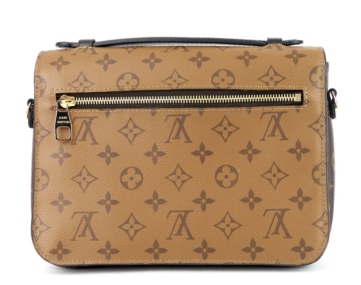 pochette metis reverse monogram canvas bag