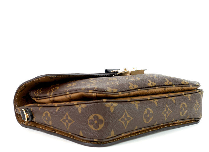 pochette metis reverse monogram canvas bag