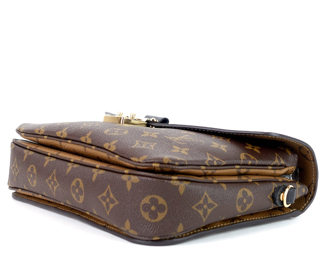 pochette metis reverse monogram canvas bag
