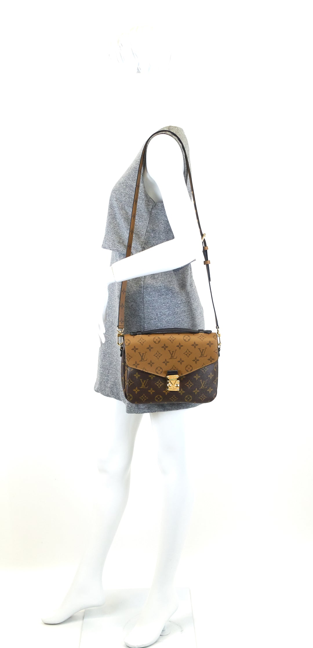 pochette metis reverse monogram canvas bag