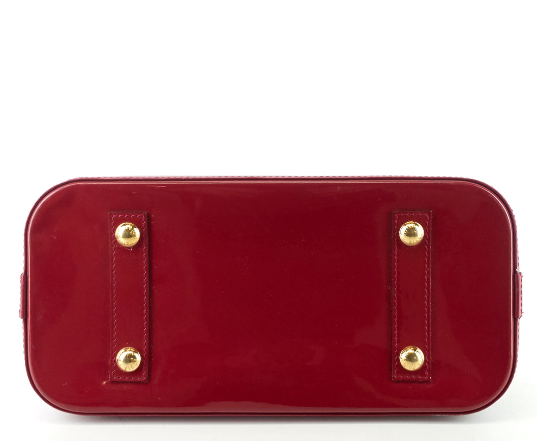 alma pm monogram vernis leather handbag