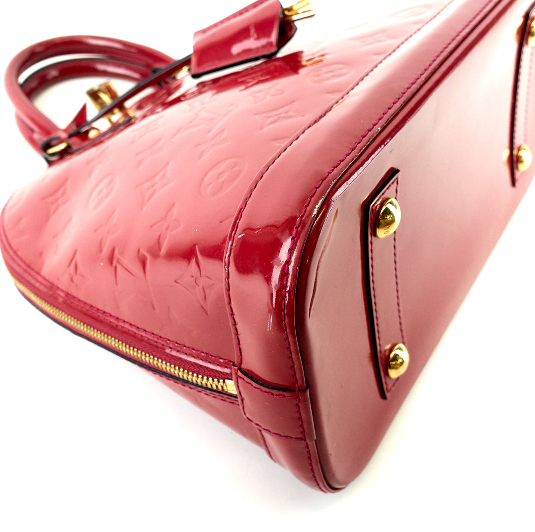 alma pm monogram vernis leather handbag