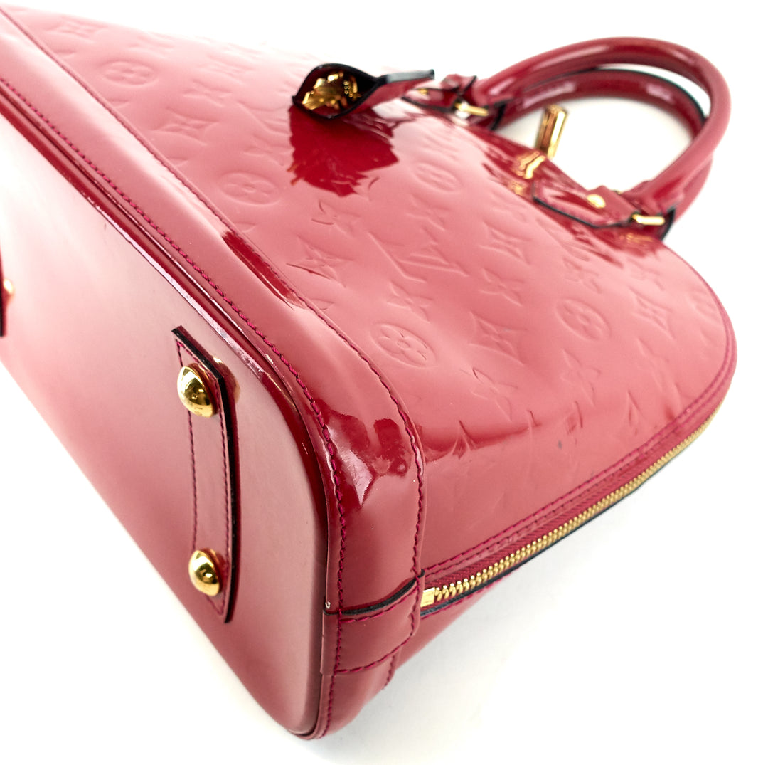 alma pm monogram vernis leather handbag