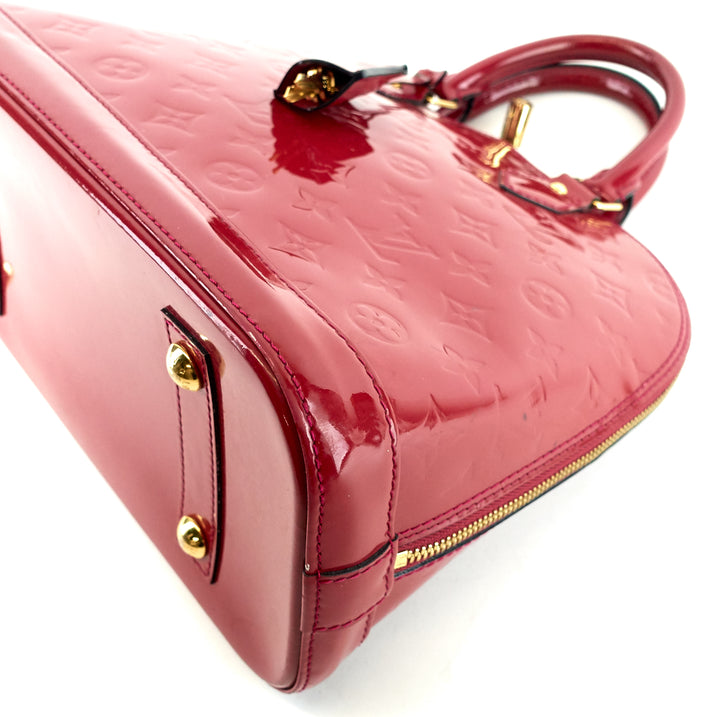 alma pm monogram vernis leather handbag