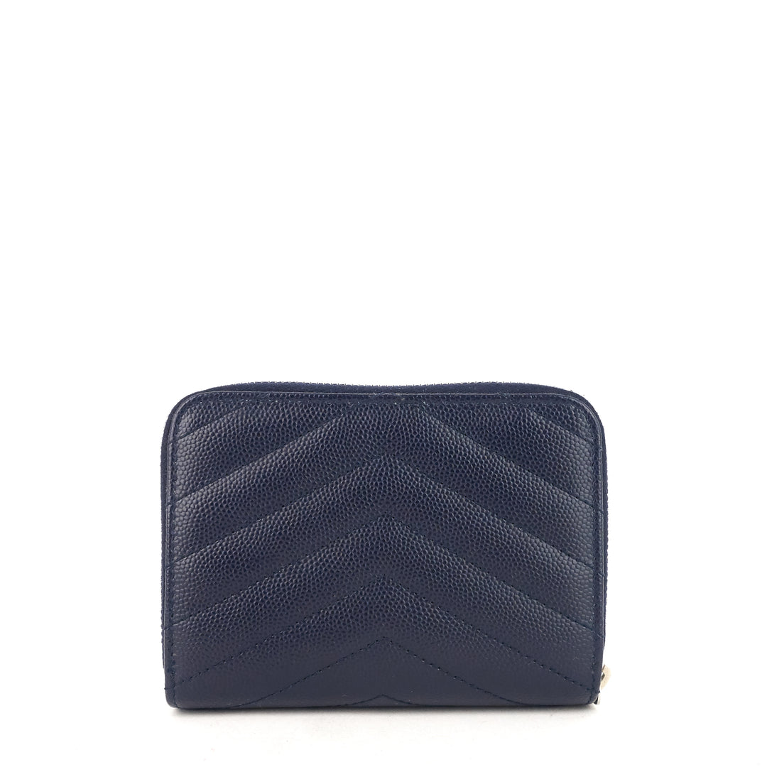 monogram compact zip-around leather wallet