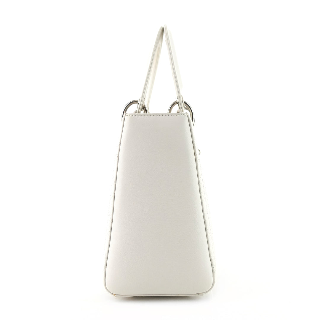 lady dior medium lambskin handbag with strap
