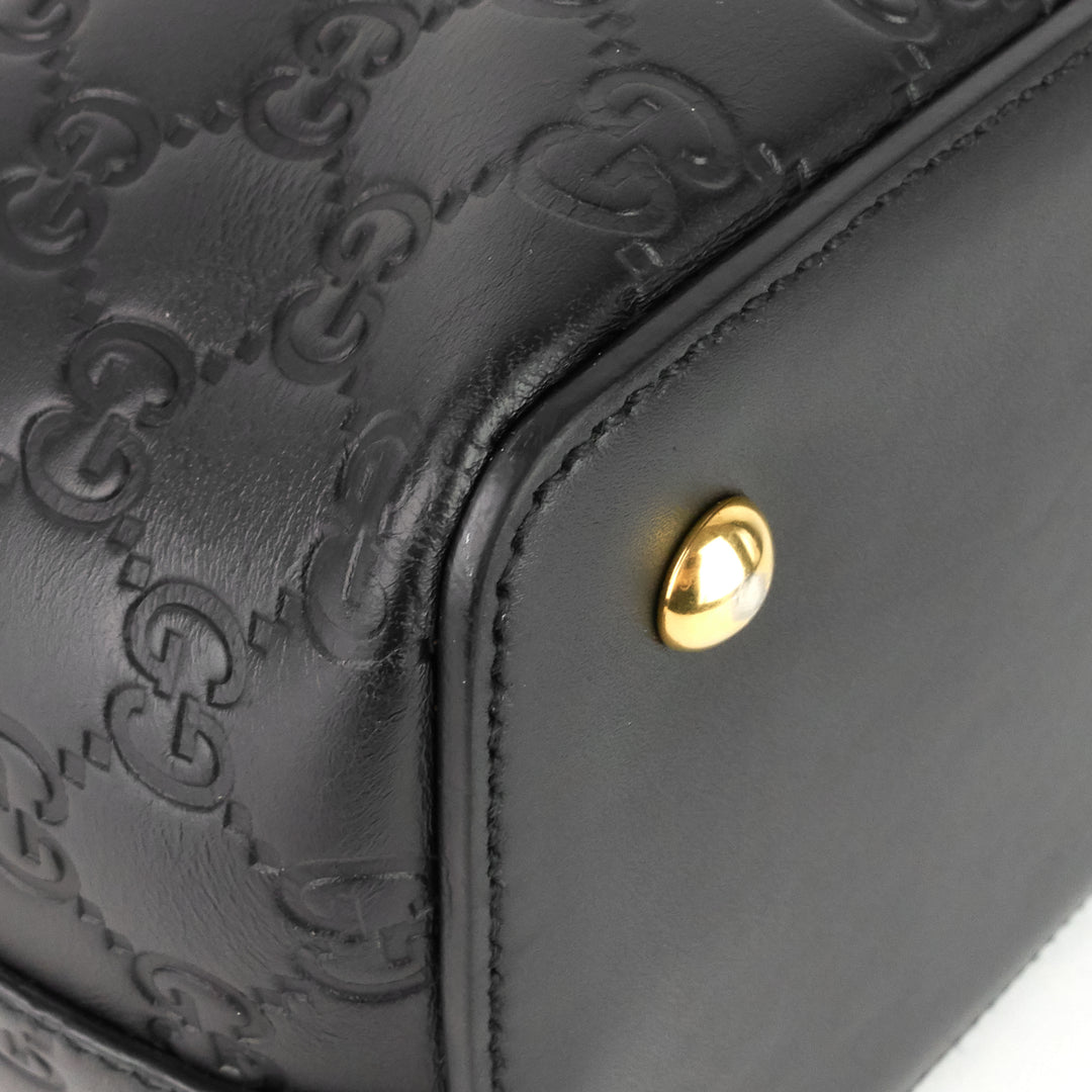 signature top handle guccissima bag
