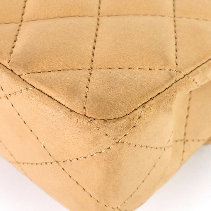 east west quilted lambskin flap bag