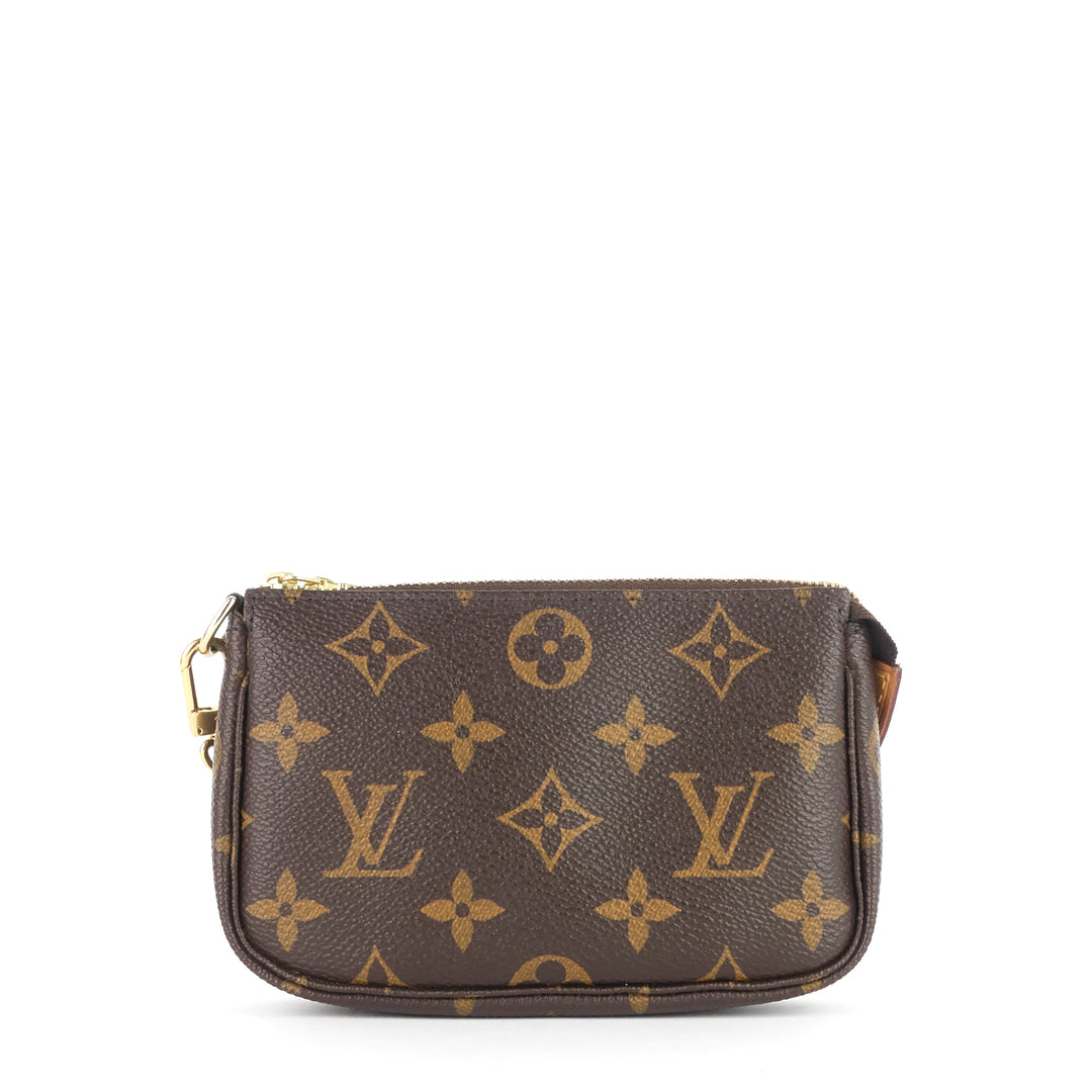 pochette accessoires mini monogram canvas bag