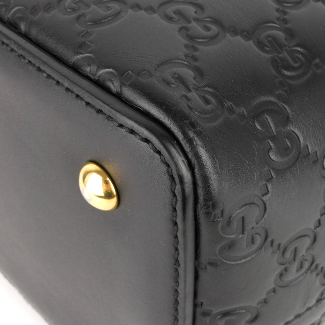 signature top handle guccissima bag
