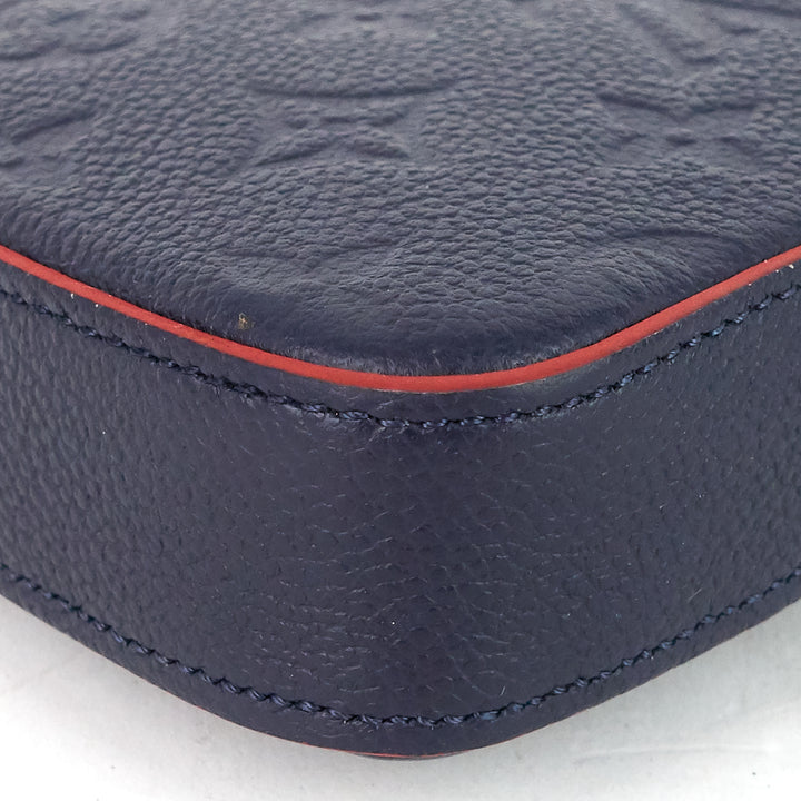 félicie pochette monogram empreinte leather bag