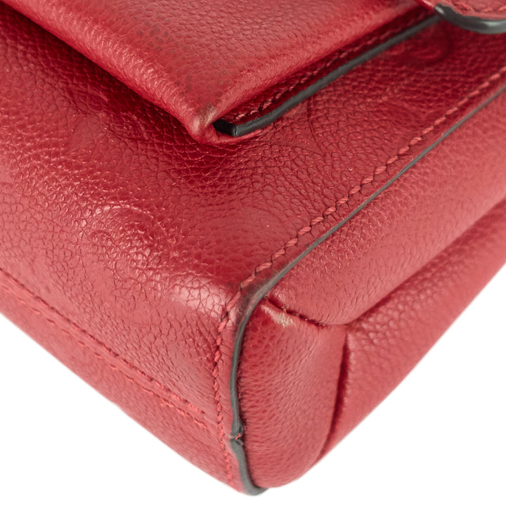 vavin pm monogram empreinte leather bag