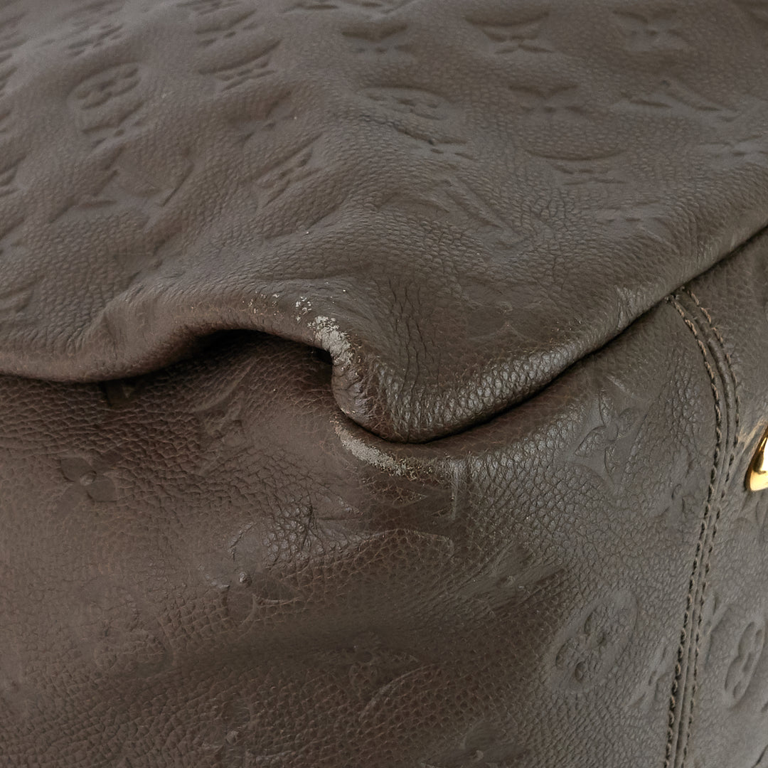 artsy mm monogram empreinte leather bag