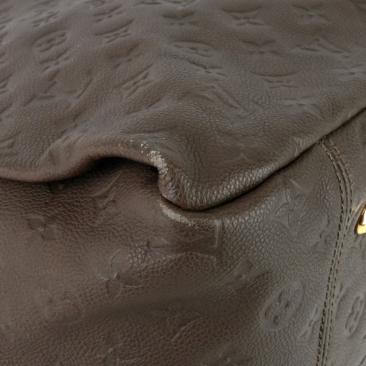 artsy mm monogram empreinte leather bag
