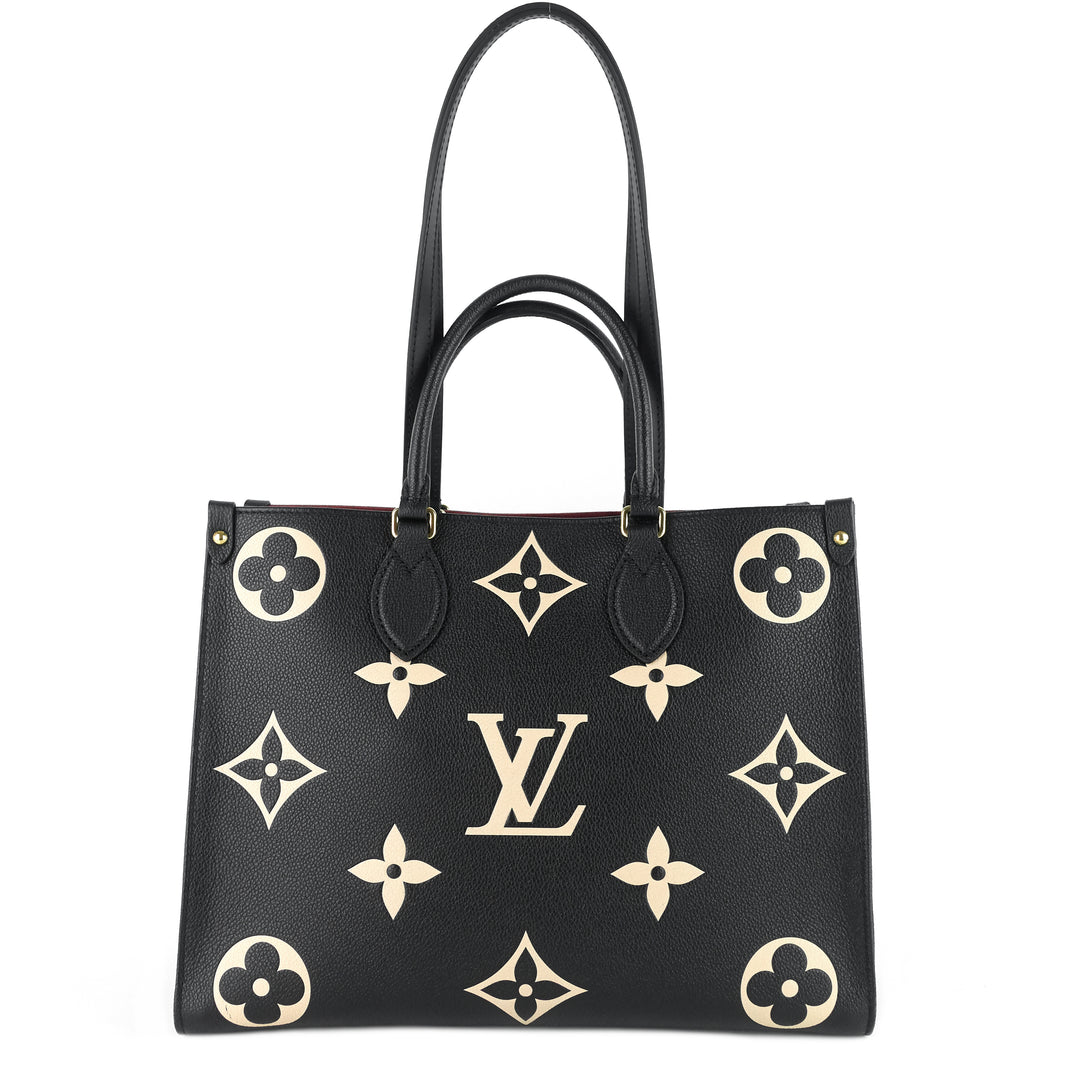onthego mm bicolour monogram empreinte leather bag
