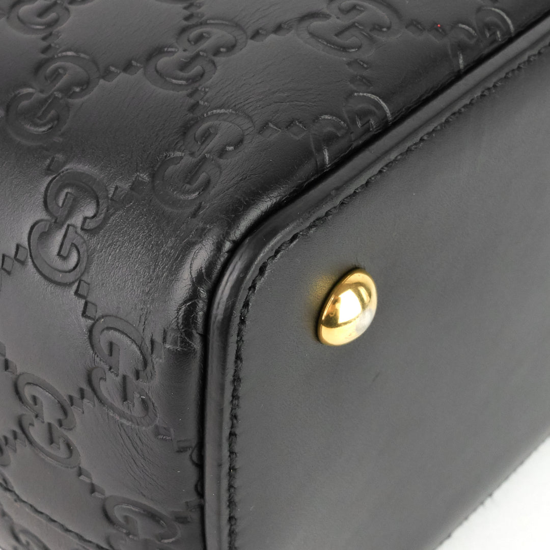 signature top handle guccissima bag