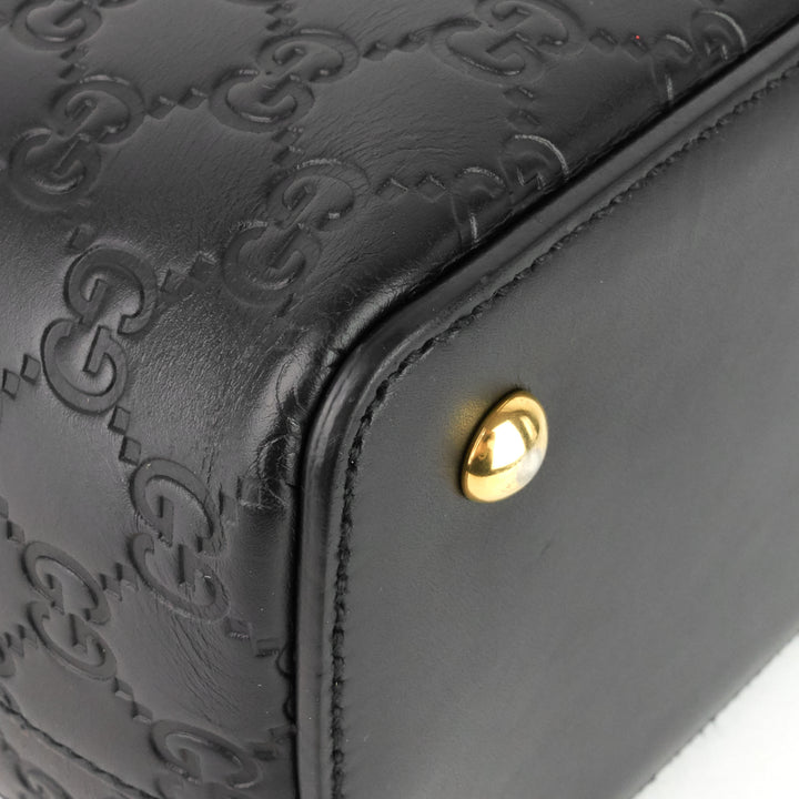 signature top handle guccissima bag