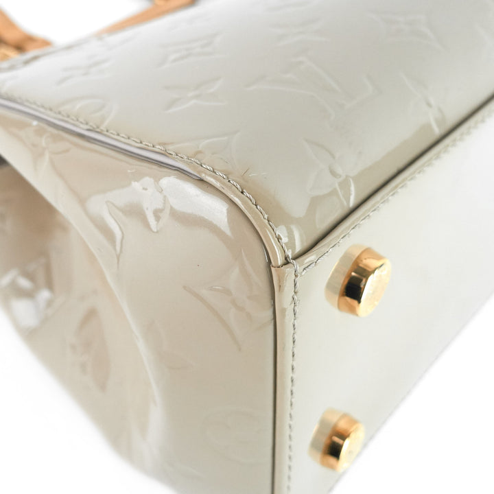 brea mm beige poudre monogram vernis leather bag