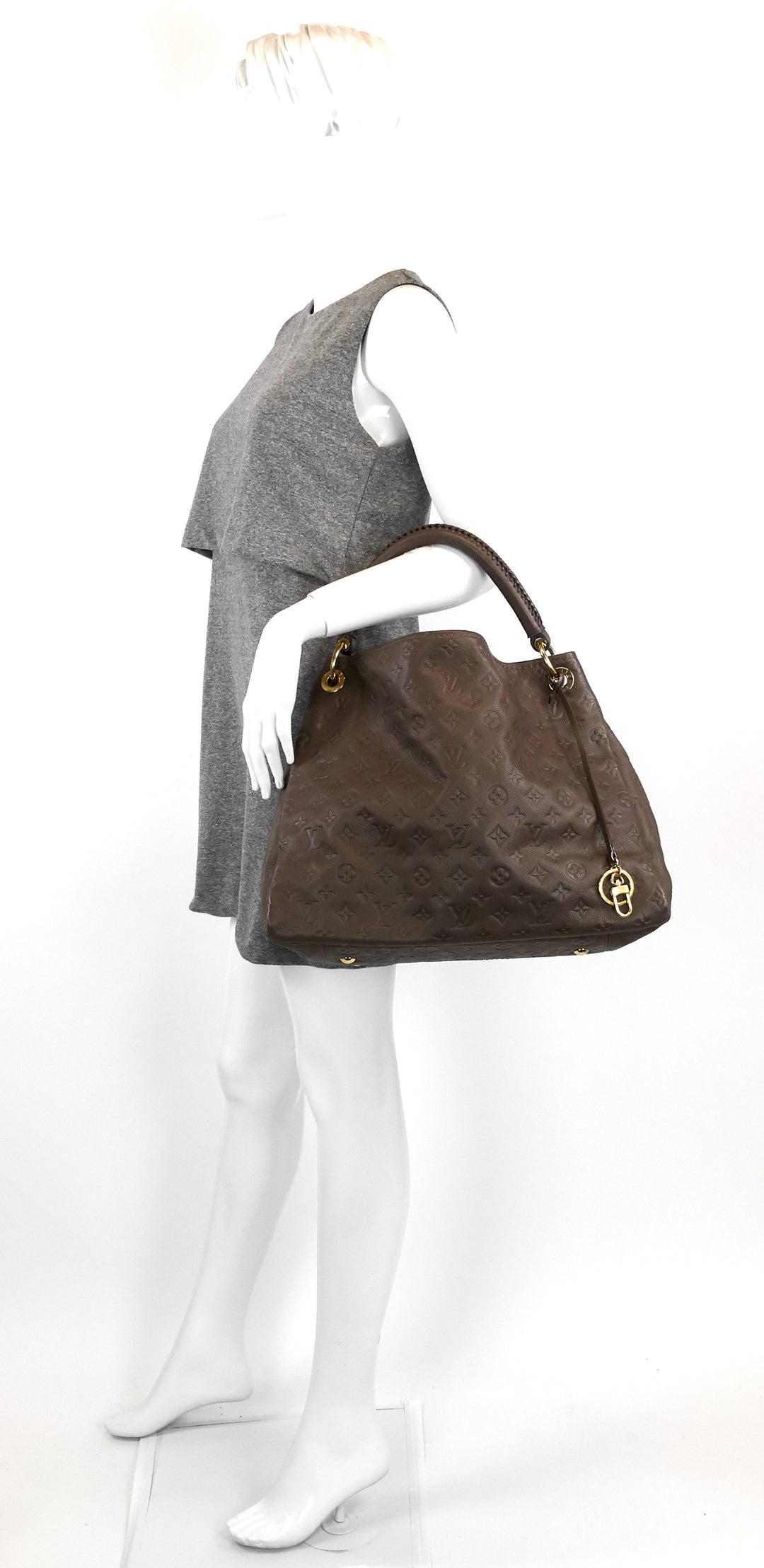 artsy mm monogram empreinte leather bag