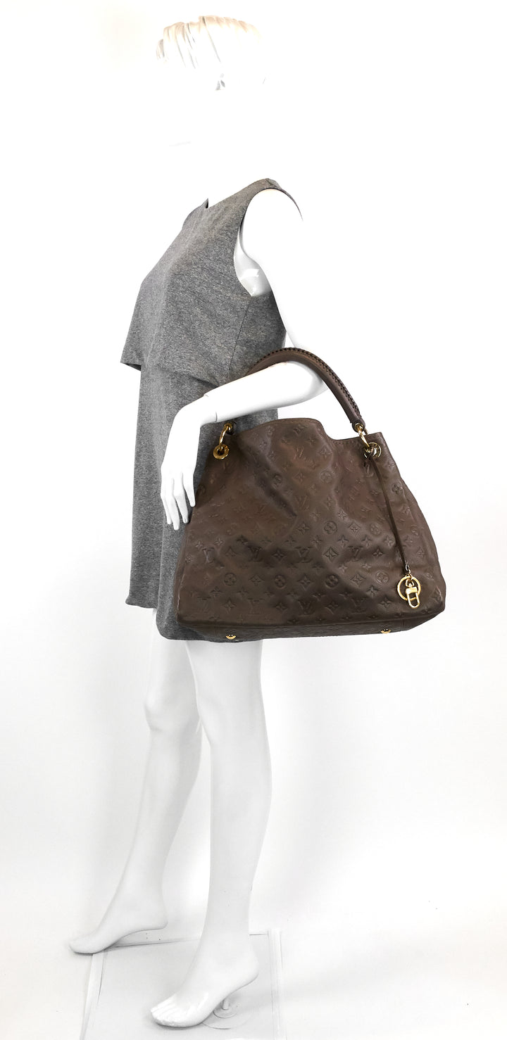 artsy mm monogram empreinte leather bag