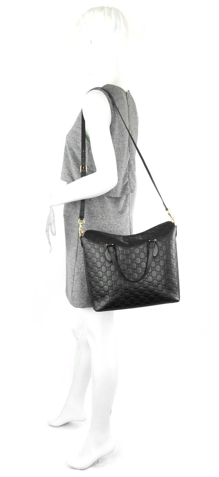 signature top handle guccissima bag