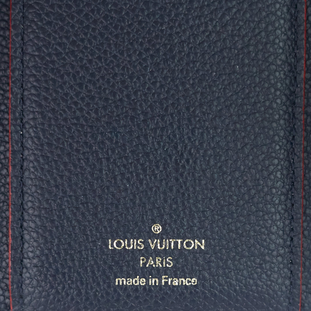 victorine monogram empreinte leather wallet