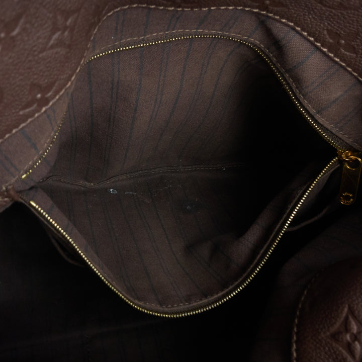 artsy mm monogram empreinte leather bag
