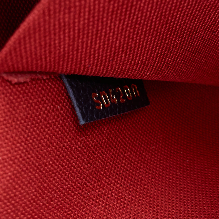 félicie pochette monogram empreinte leather bag