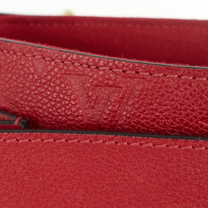 vavin pm monogram empreinte leather bag