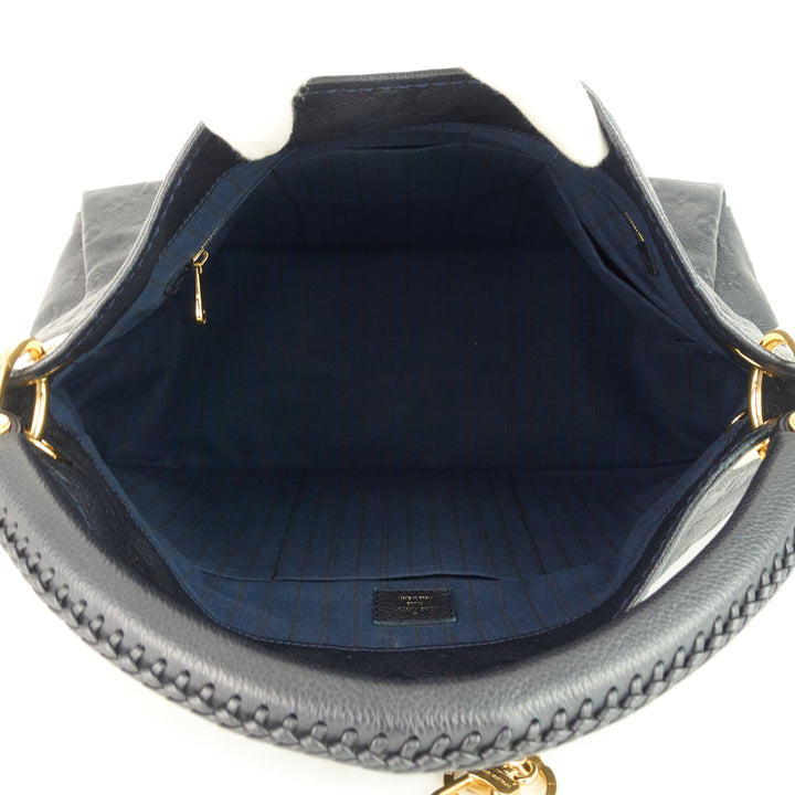 artsy mm monogram empreinte leather bag