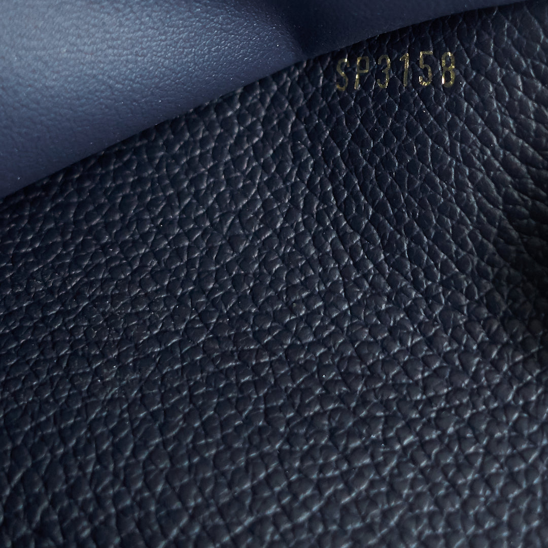 victorine monogram empreinte leather wallet