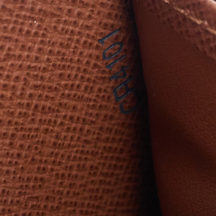 zippy monogram canvas wallet