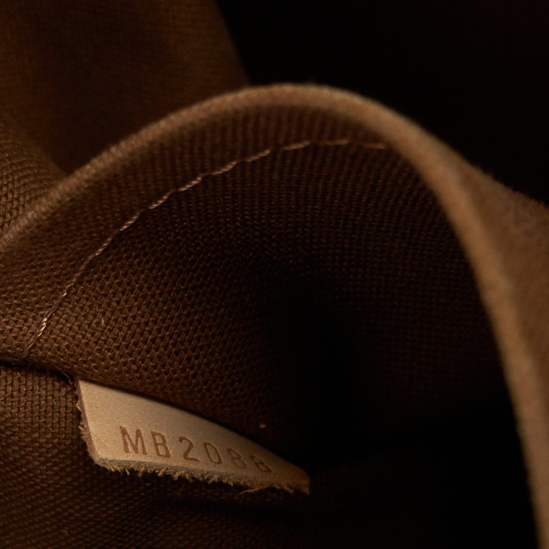 tulum gm monogram canvas hobo bag