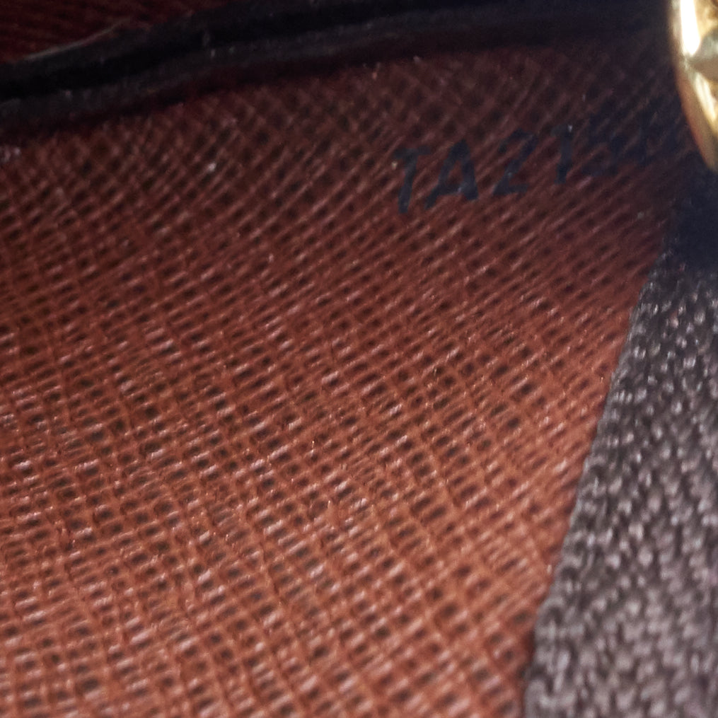 key monogram canvas pouch
