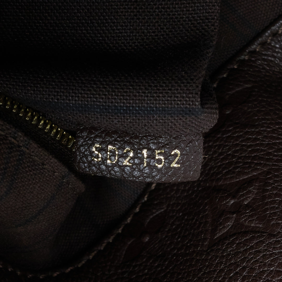 artsy mm monogram empreinte leather bag