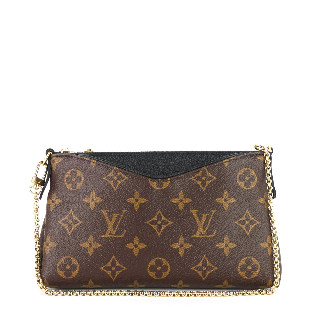 pallas monogram canvas clutch bag