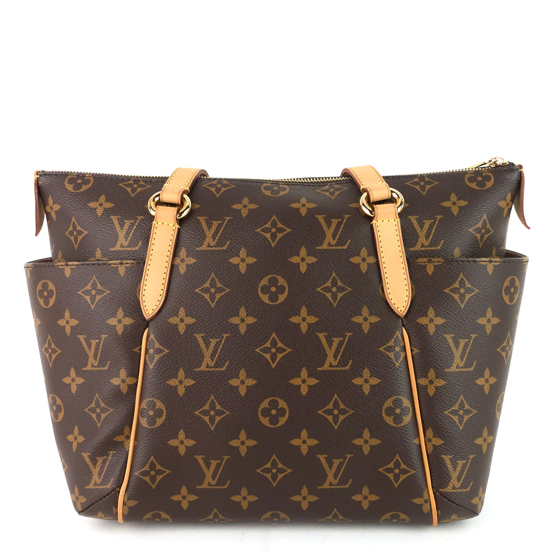 totally pm monogram canvas bag