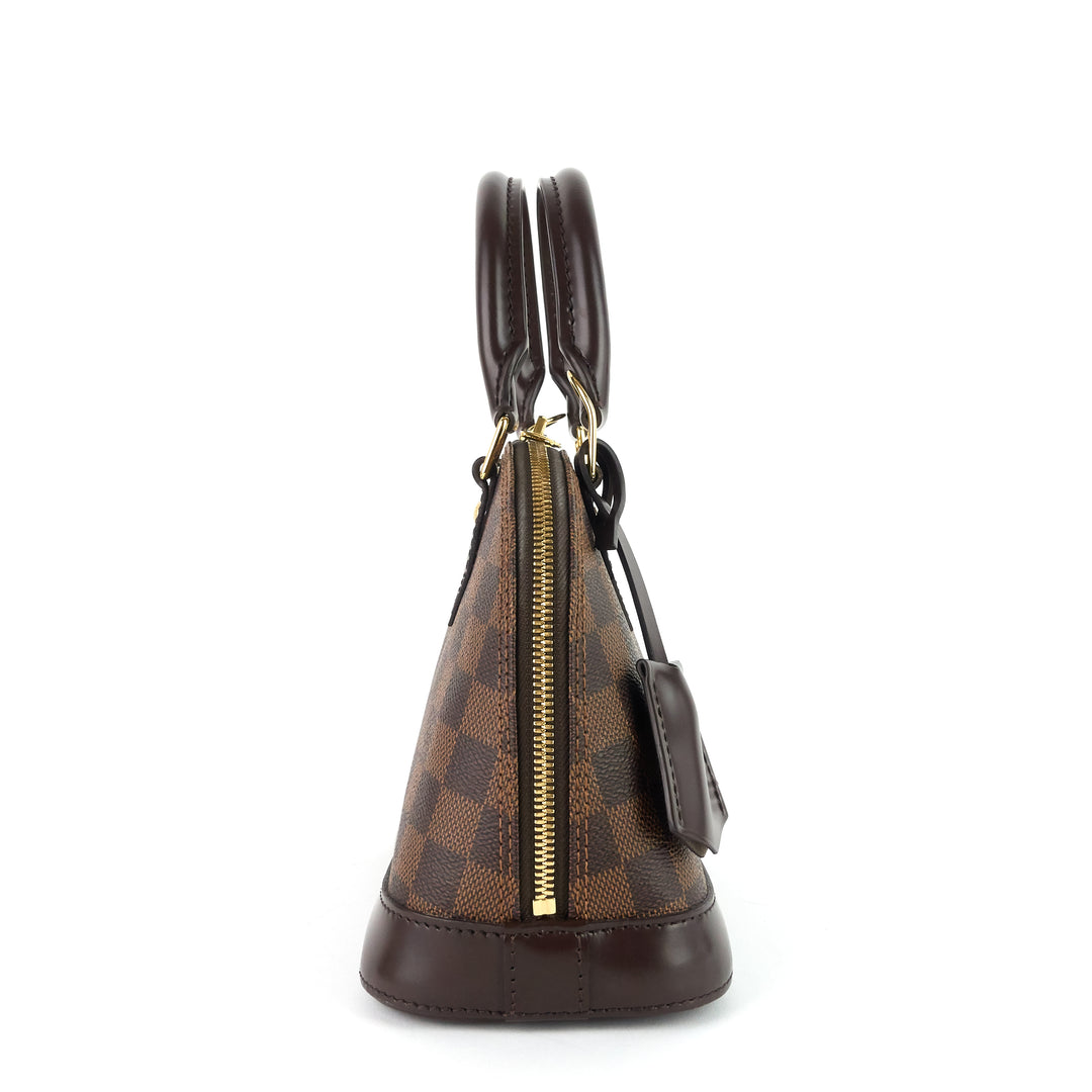 alma bb damier ebene canvas handbag