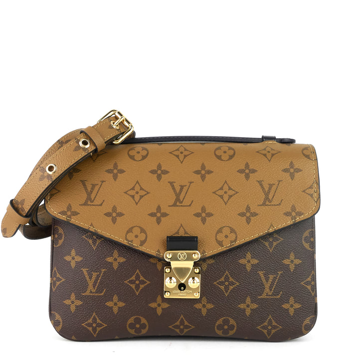pochette metis reverse monogram canvas bag