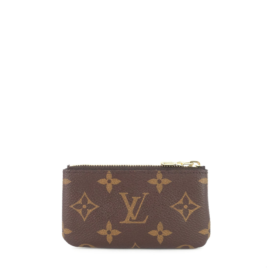 key monogram canvas pouch