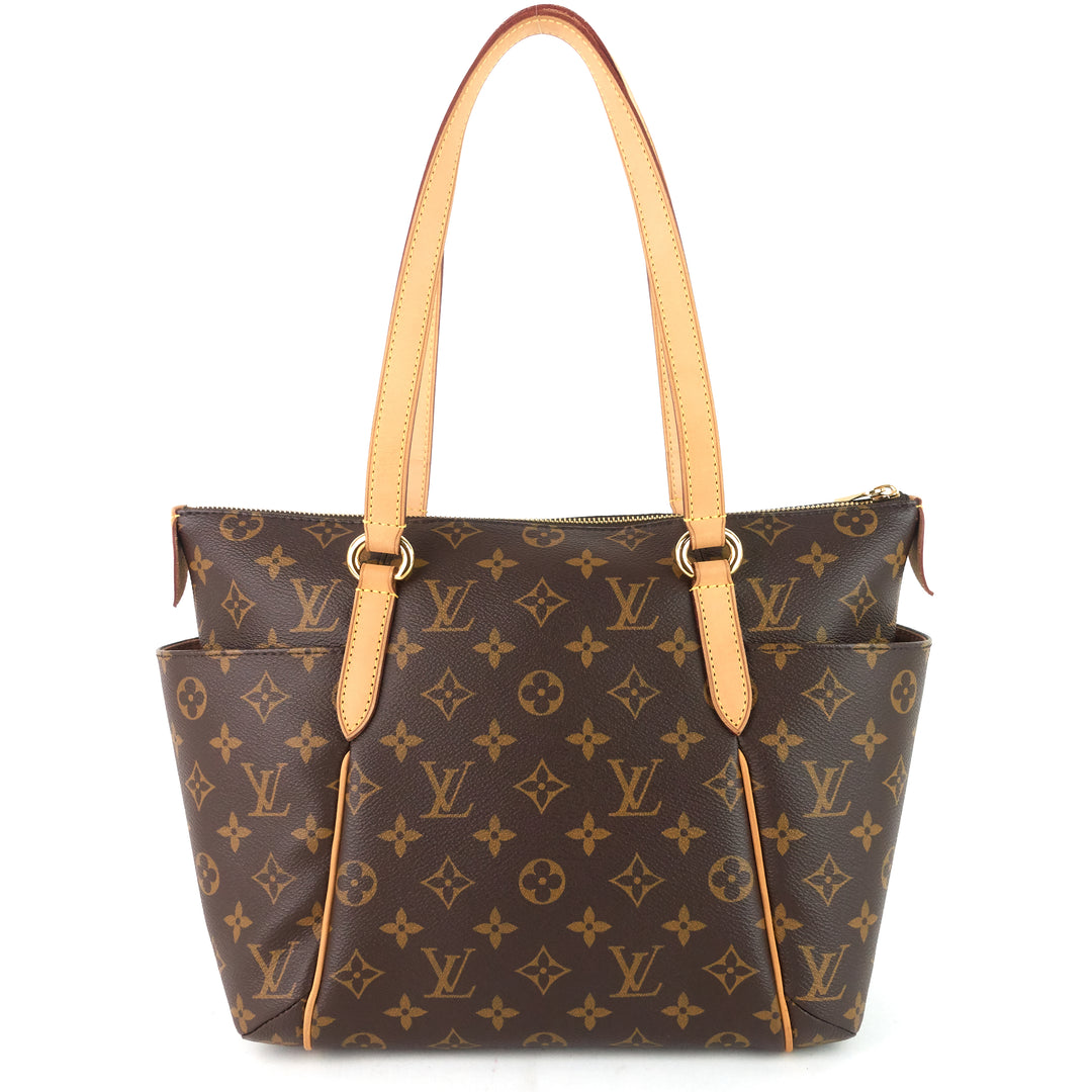 totally pm monogram canvas bag