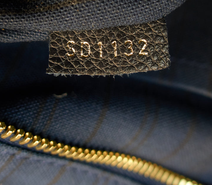 citadine pm monogram empreinte leather tote bag