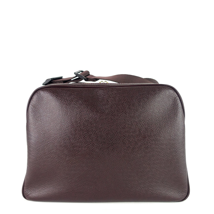 reporter pm taiga leather messenger bag