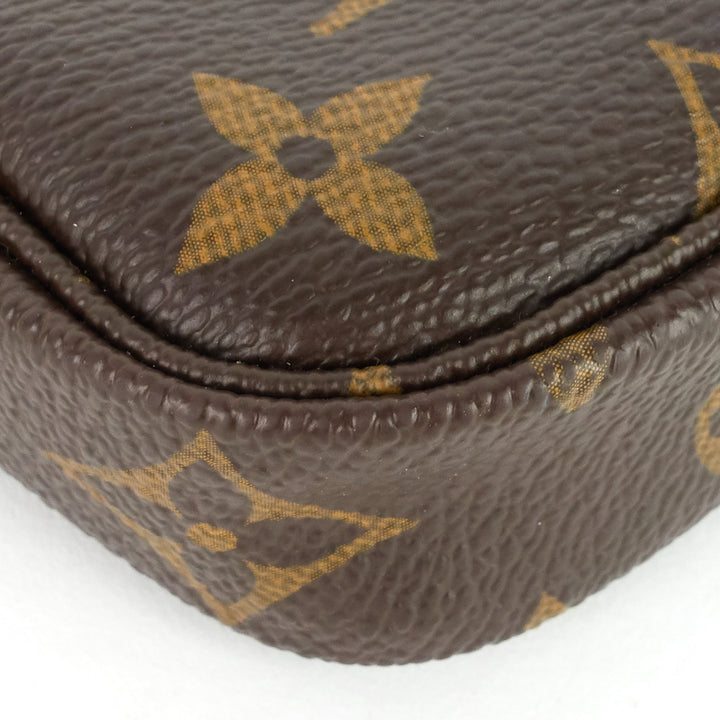 pochette accessoires mini monogram canvas bag