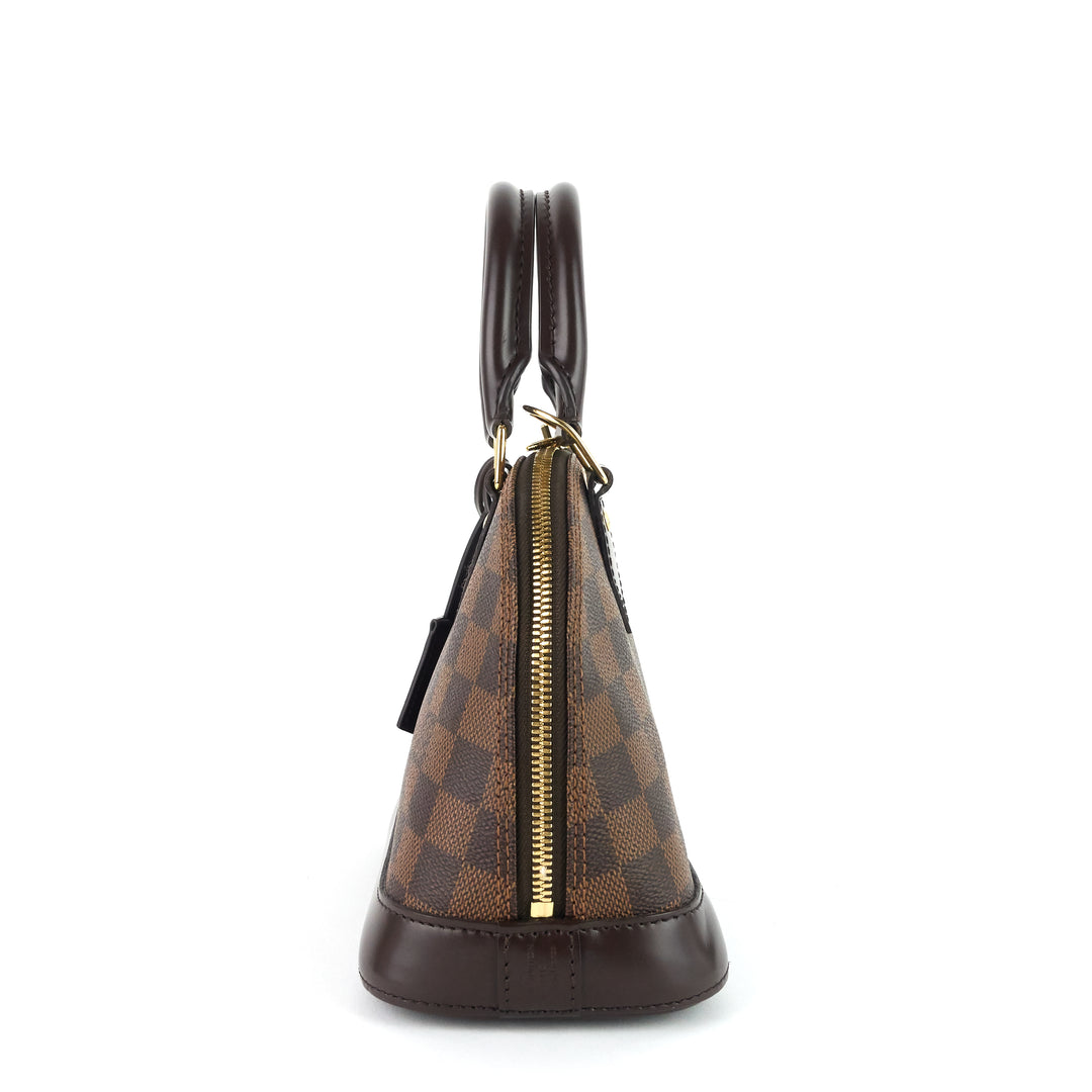 alma bb damier ebene canvas handbag