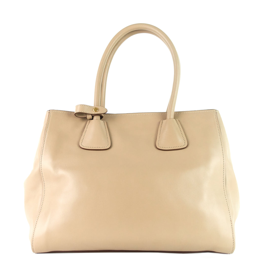 front pocket convertible wing soft leather tote bag