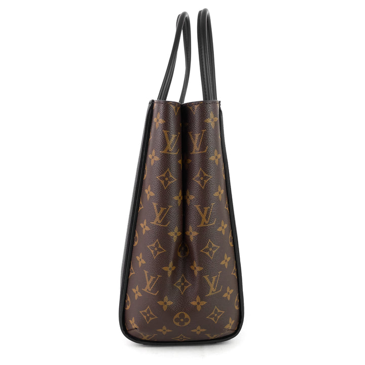 kimono monogram canvas and black leather bag