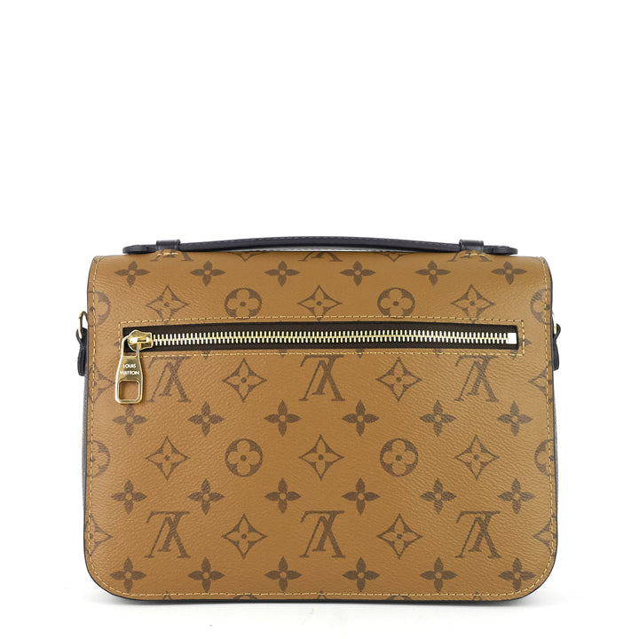 pochette metis reverse monogram canvas bag
