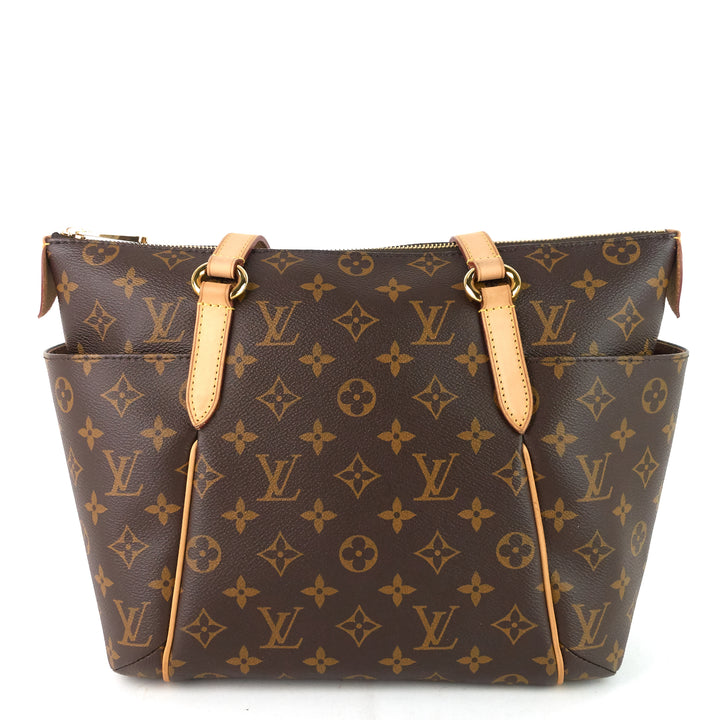 totally pm monogram canvas bag