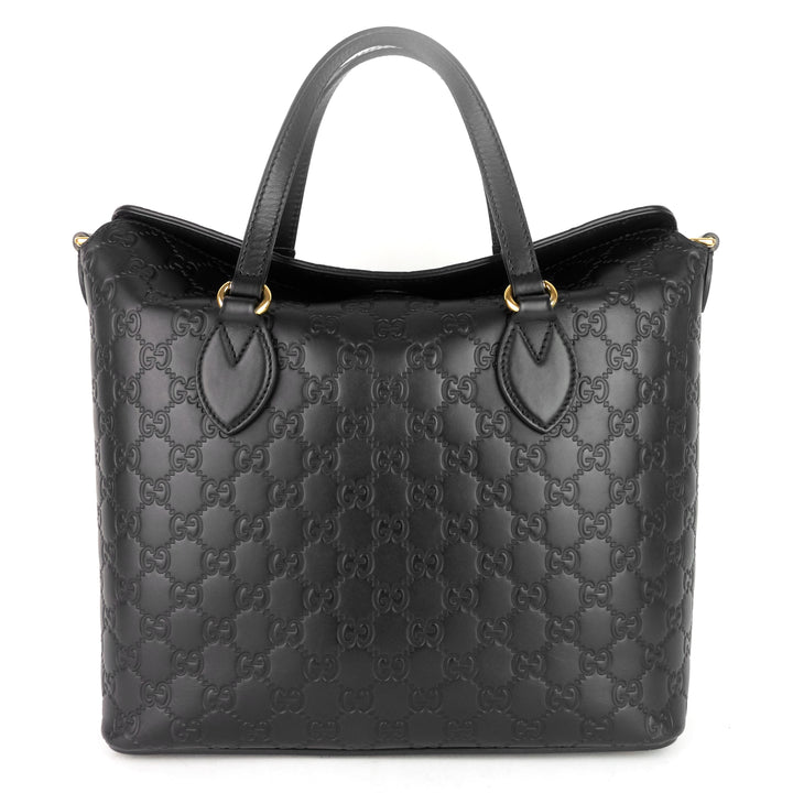signature top handle guccissima bag